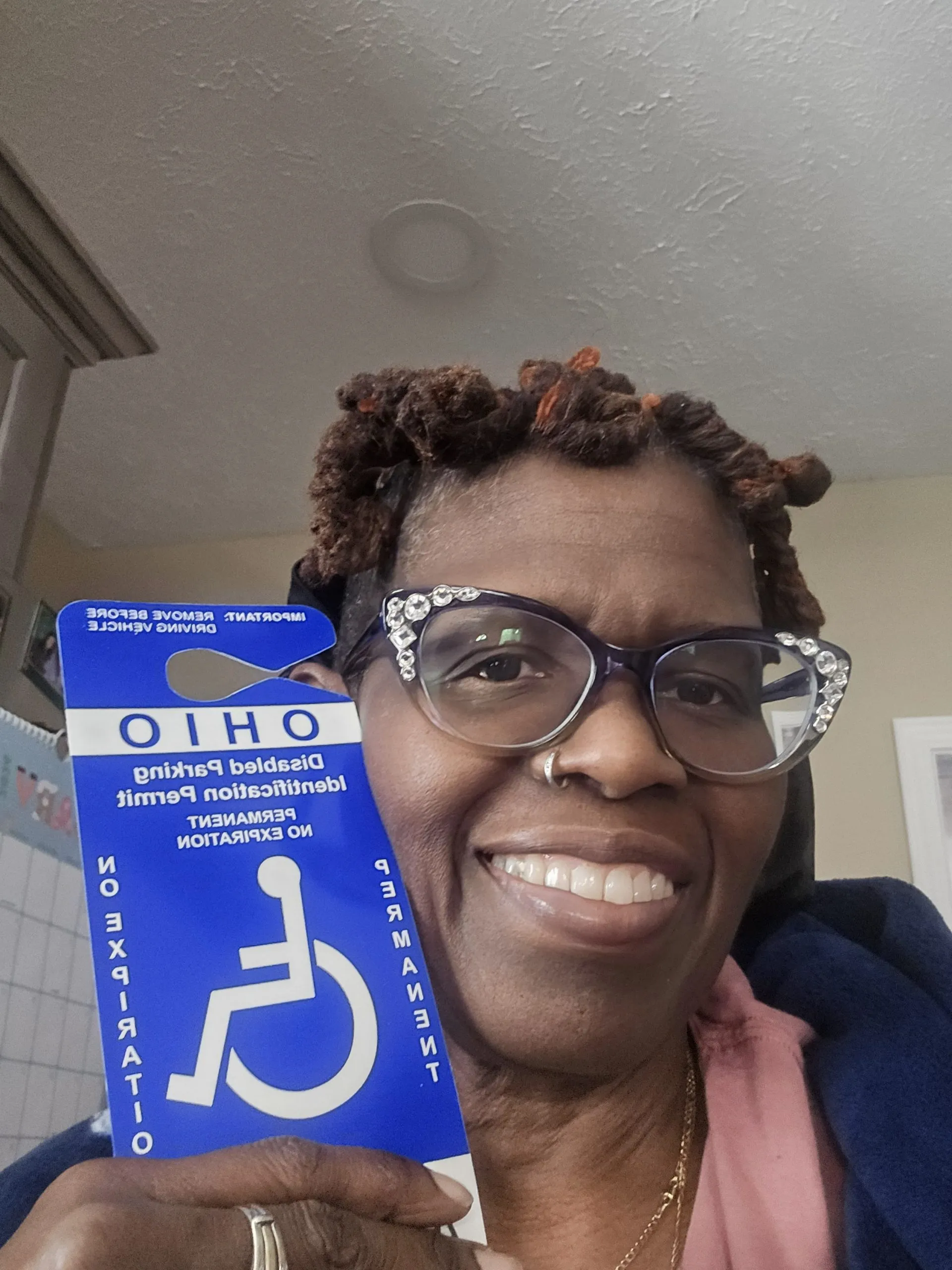 Deb L. – Ohio with their disability parking placard