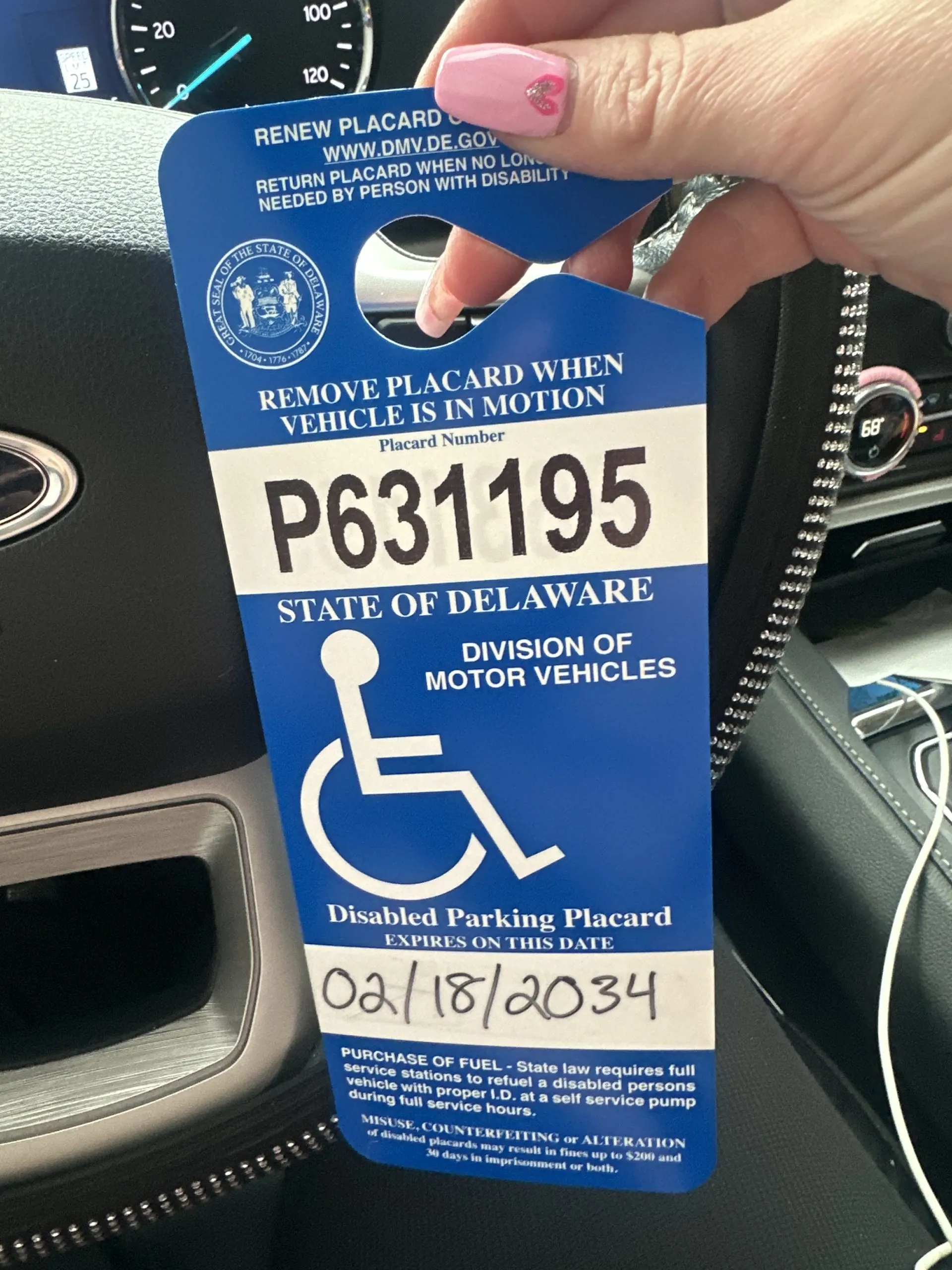 Amanda L. – Delaware with their disability parking placard
